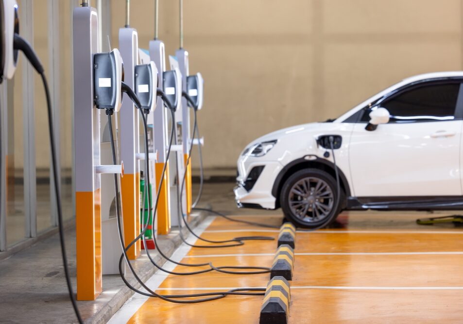 Homeowner charging an electric vehicle using a newly installed home EV charger